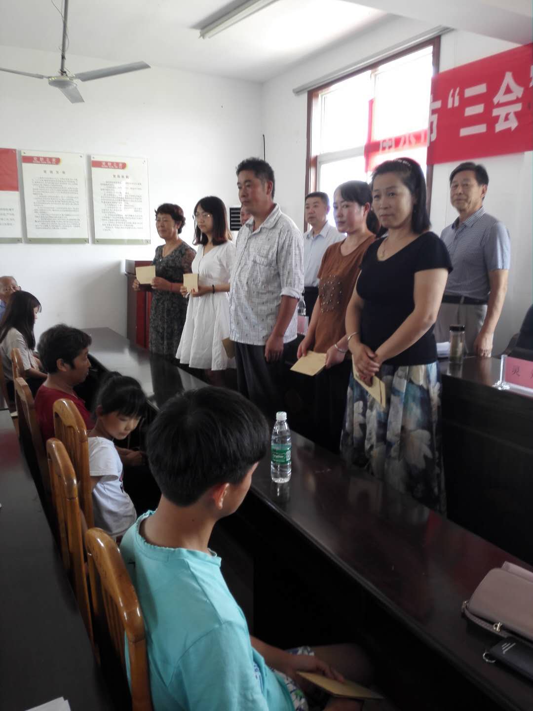 市扶贫"三会"到六合区竹镇镇乌石村开展助学扶贫现场捐资发放活动
